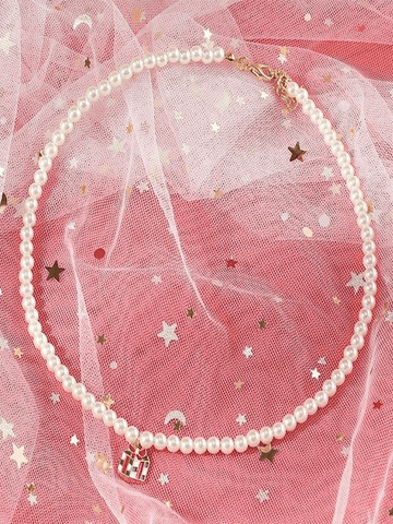 Collar de perlas navideñas