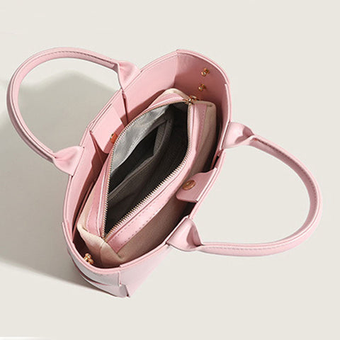 Precioso bolso tote vegano con asa superior, color liso, con diseño intrecciato - Rosa