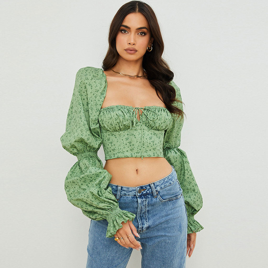 Top corto con mangas abullonadas y corpiño anudado al frente con estampado de florecitas - Verde