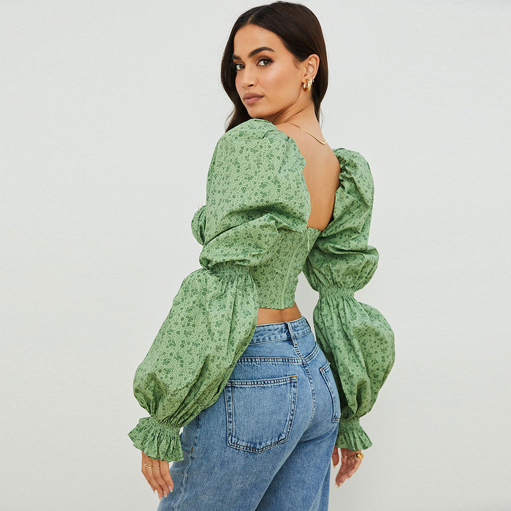 Top corto con mangas abullonadas y corpiño anudado al frente con estampado de florecitas - Verde