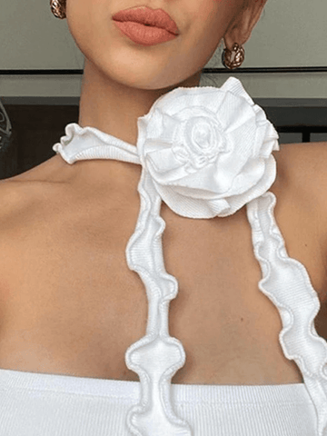 Top corto de canalé con cuello halter y estampado floral