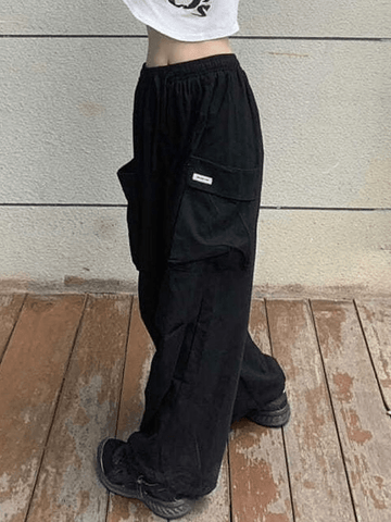 Pantalones cargo con bolsillo y cintura alta