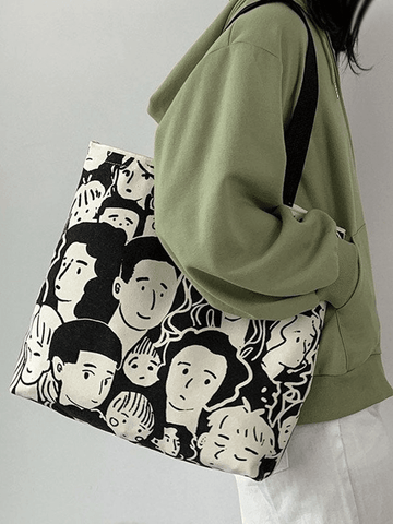 Monochrome Canvas-Shoppertasche mit Gesichtsgrafik