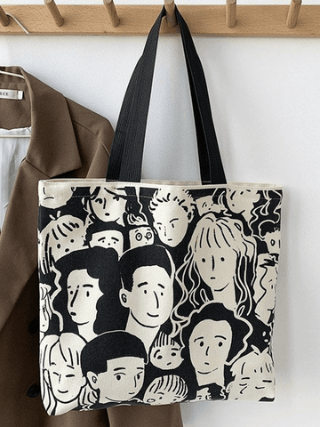 Monochrome Canvas-Shoppertasche mit Gesichtsgrafik