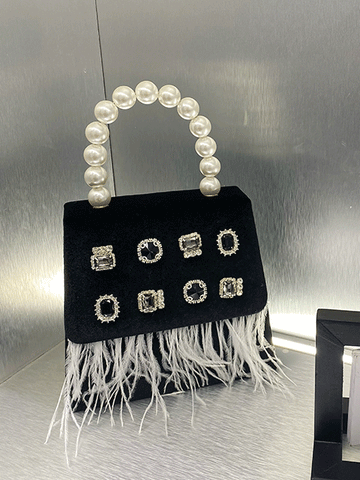 Bolso de mano de terciopelo con borlas de diamantes de imitación y perlas