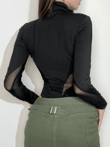 Schwarzer Body mit Patchwork-Netzstoff und langen Ärmeln