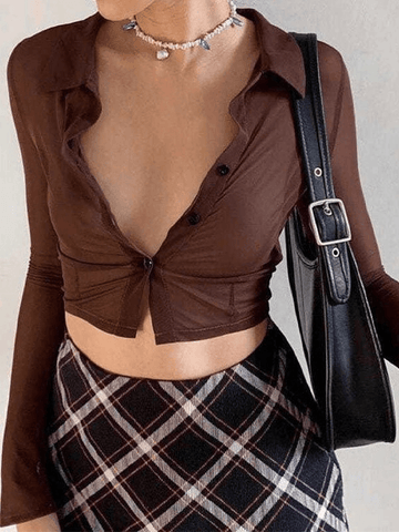 Blusa corta de manga larga de malla con cuello polo