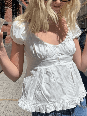 Bluse mit geknöpften Puffärmeln und Rüschen